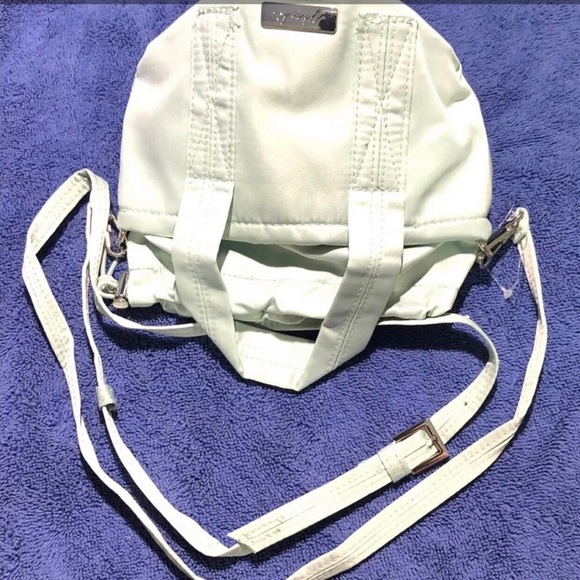 Pink  crossbody bucket handbag with adjustable removable straps mint. 4.5Wx5H. - Picture 2 of 3